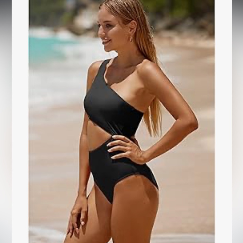 BNWT beautiful cut out one piece swimsuits